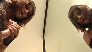 Redhead Ladyboy In dark underware Sucks A dildo By The Mirror